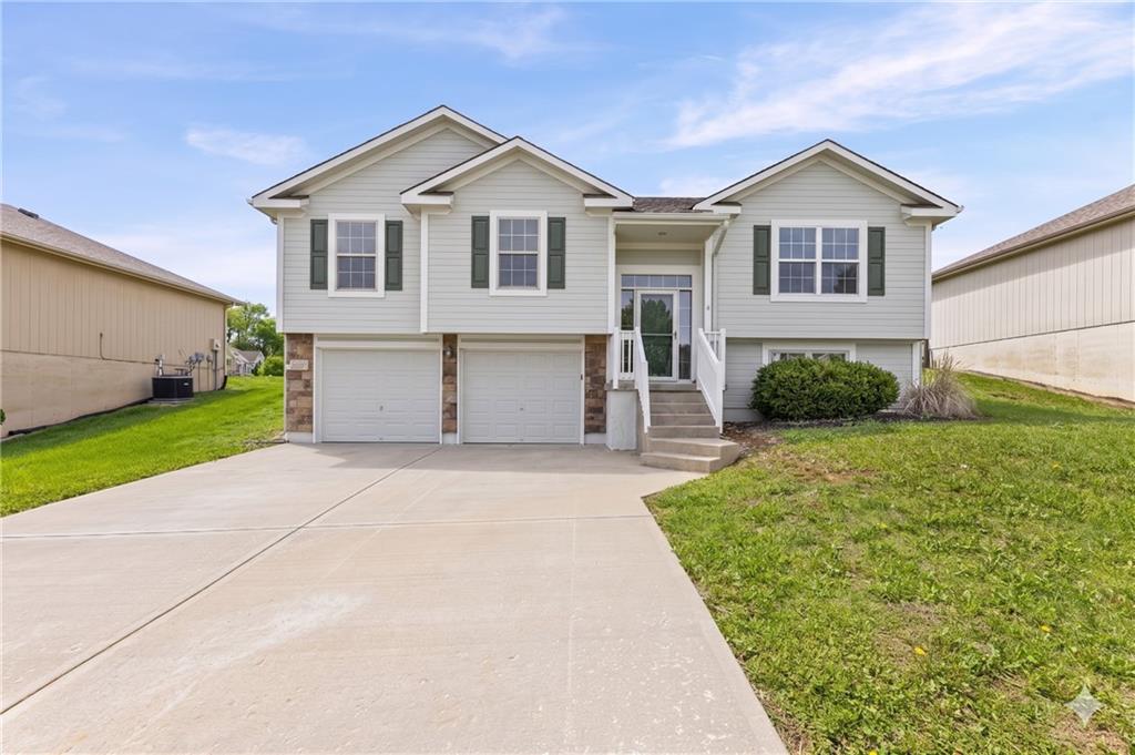 Front exterior of 7219 Rymeg Street, a renovated split-entry home in Belton, MO