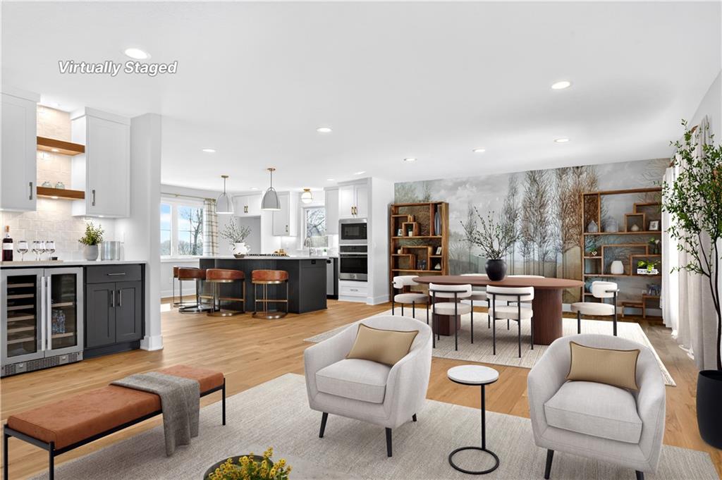 Open-concept kitchen and great room at 8206 NW Miami Street