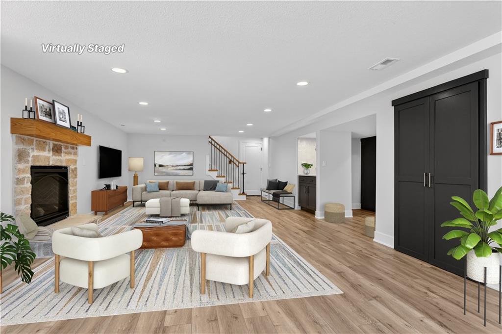 Family room with fireplace at 8206 NW Miami Street