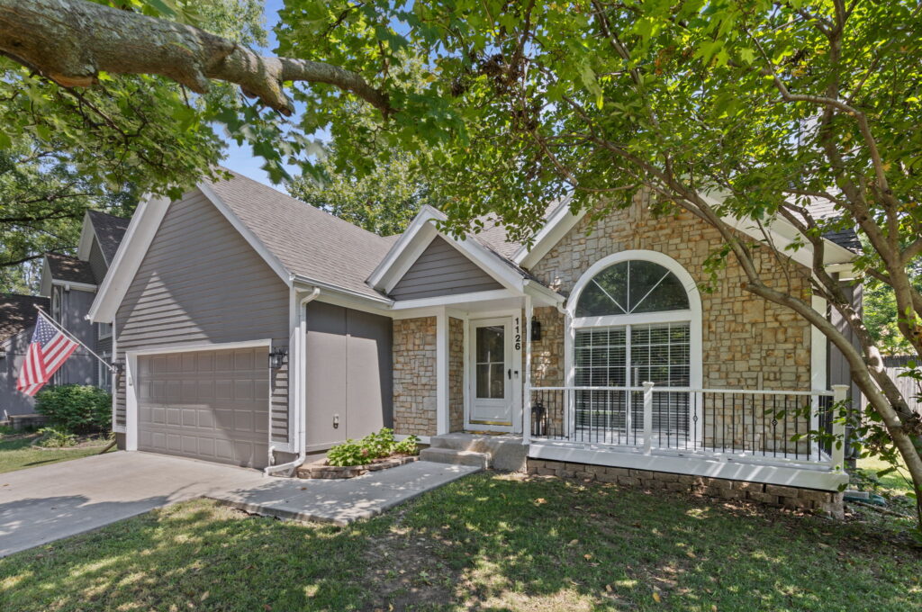 Front porch and entry of 1126 E Charlotte Town Road, Brittany Yesteryear, Olathe, KS