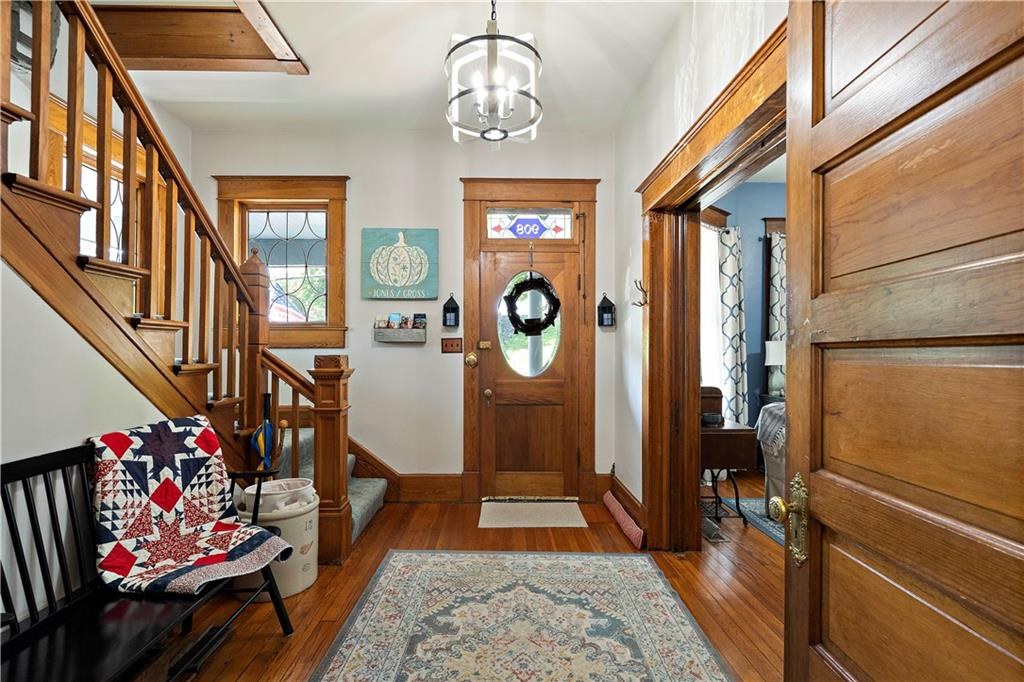 Entry and original staircase woodwork at 908 Washington Street, Weston, MO