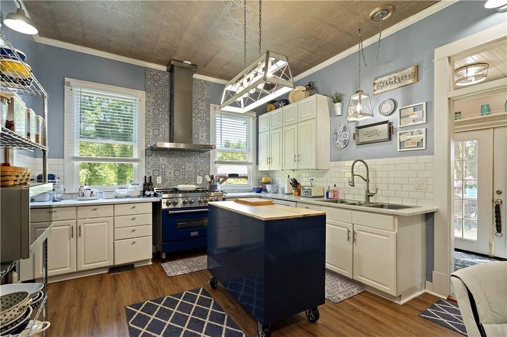 Updated kitchen with island at 908 Washington Street, Weston, MO