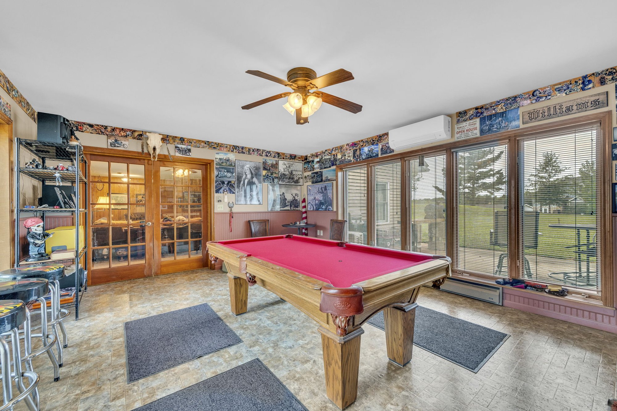 Sunroom with mini-split at 111 Cora Drive, Weston, MO