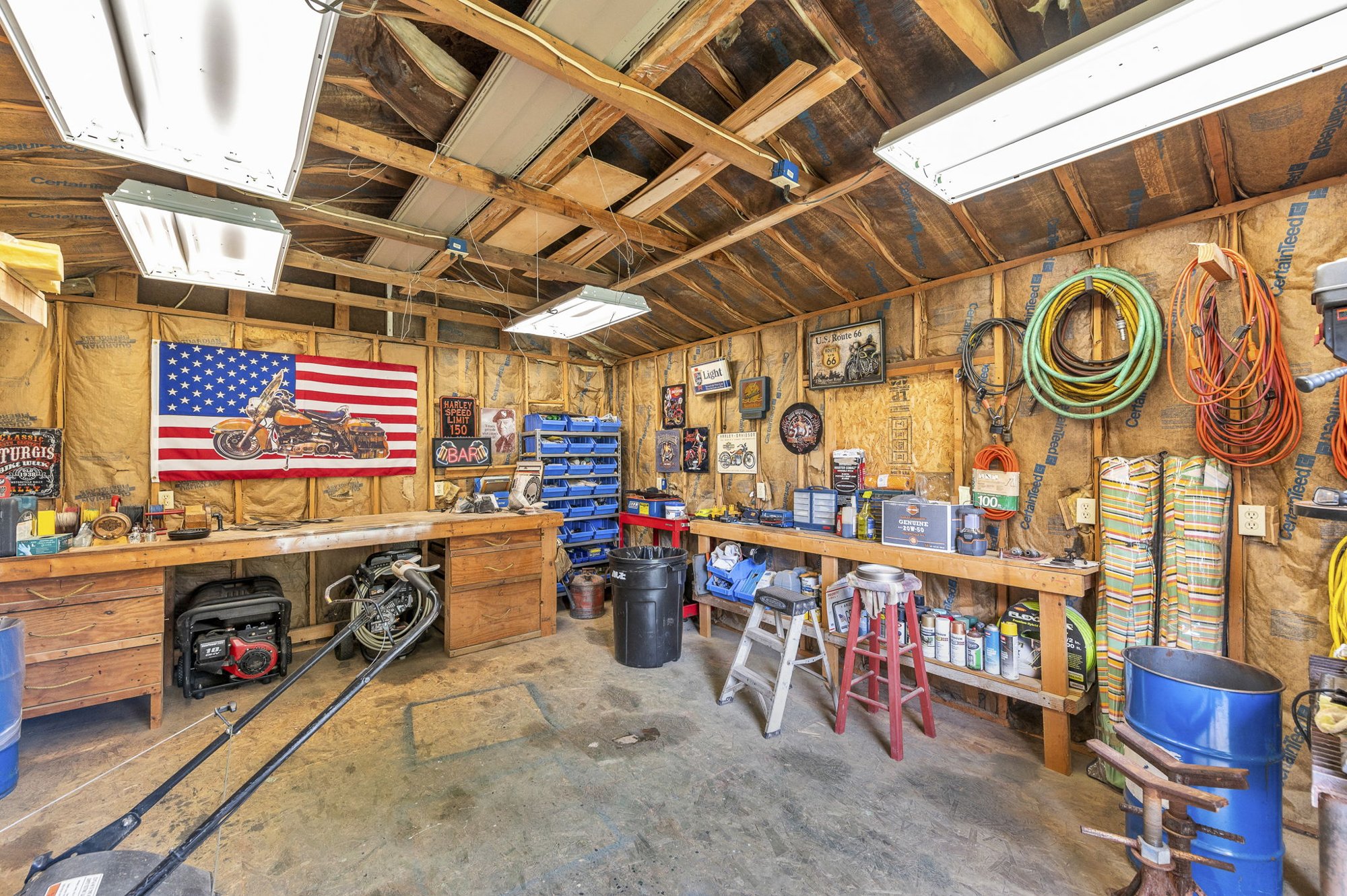 Heated workshop inside the 24x18 shed at 111 Cora Drive, Weston, MO