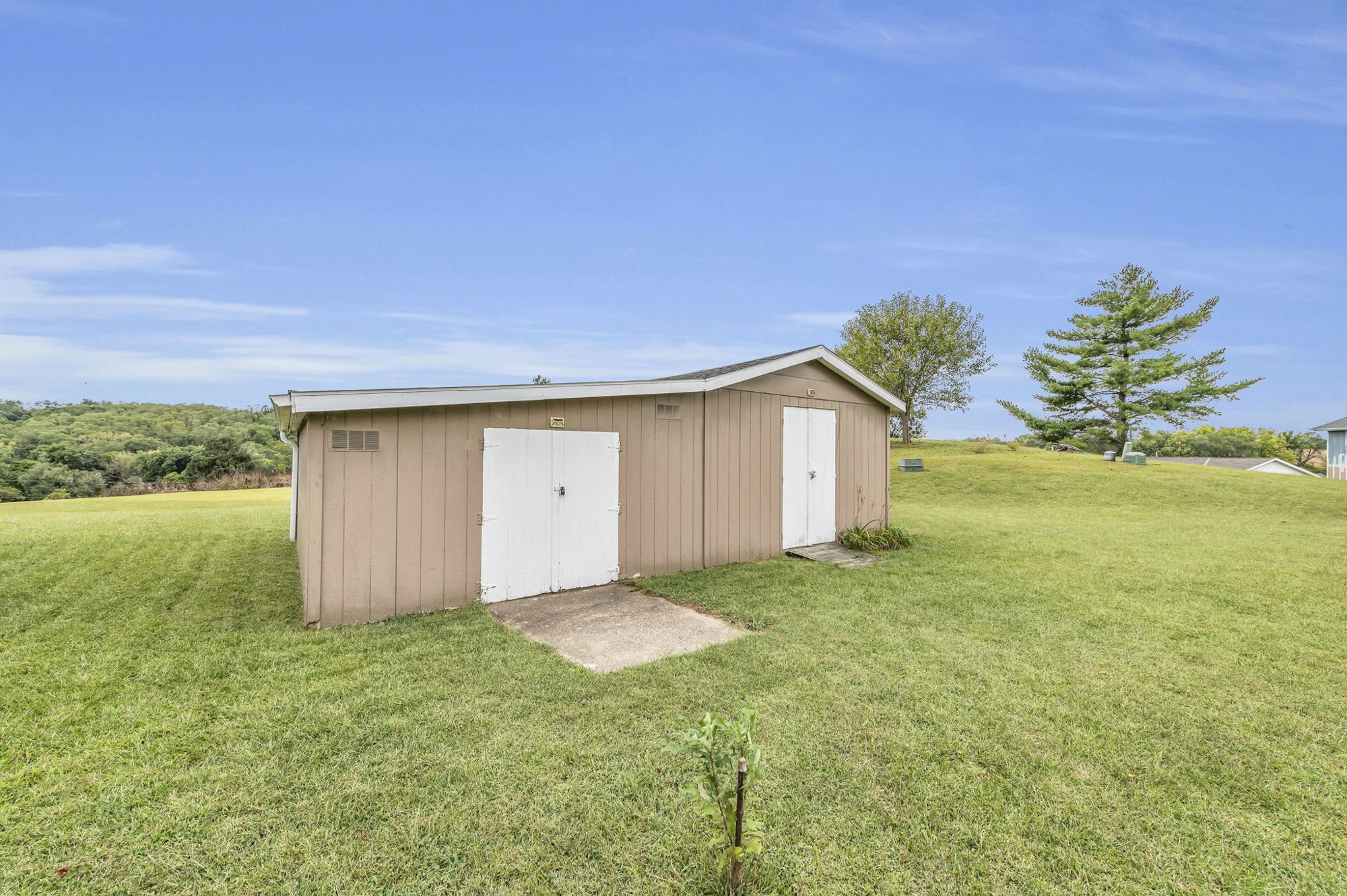 24x18 shed on the half-acre lot at 111 Cora Drive, Weston, MO