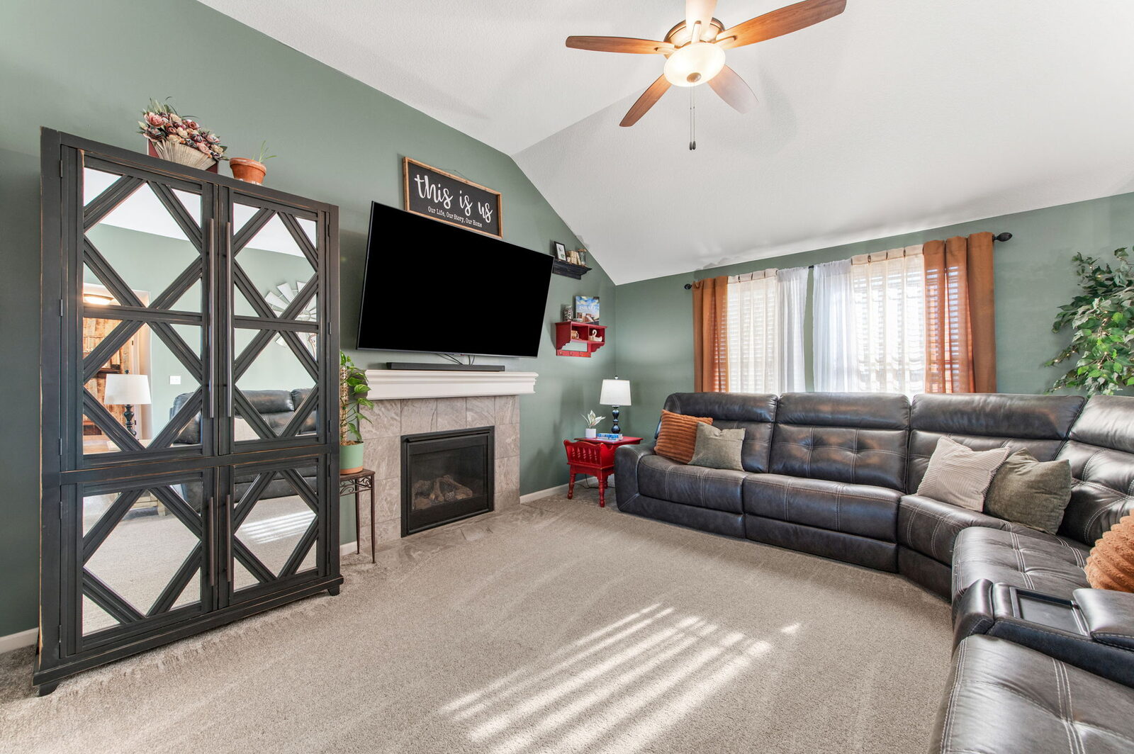 Vaulted living room with gas fireplace at 19204 Corbyn Lane, Smithville, MO