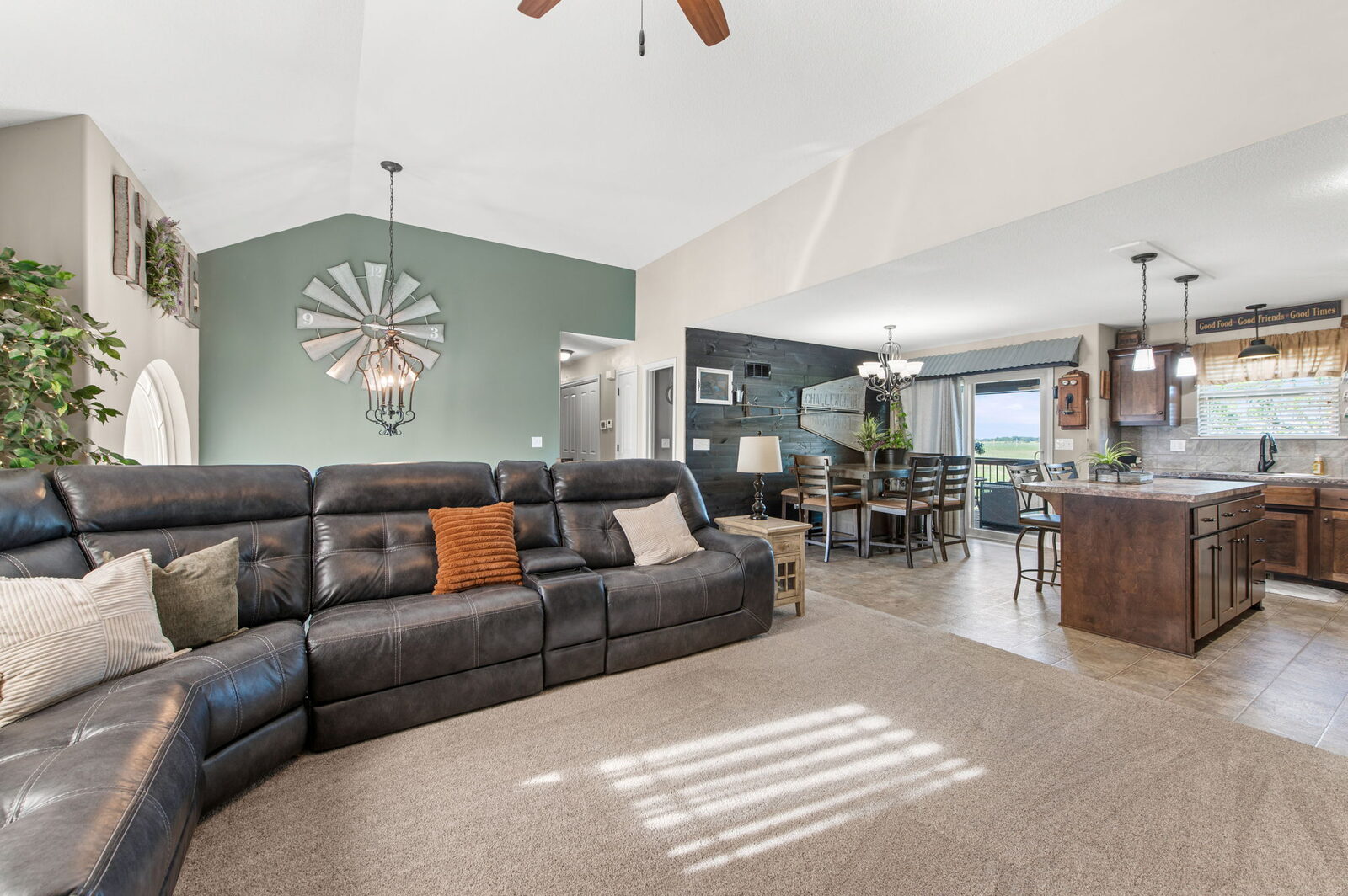 Living room open to the kitchen and dining area at 19204 Corbyn Lane, Smithville, MO