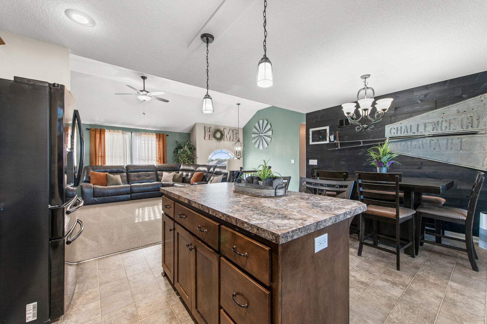 Kitchen island open to the dining area at 19204 Corbyn Lane, Smithville, MO