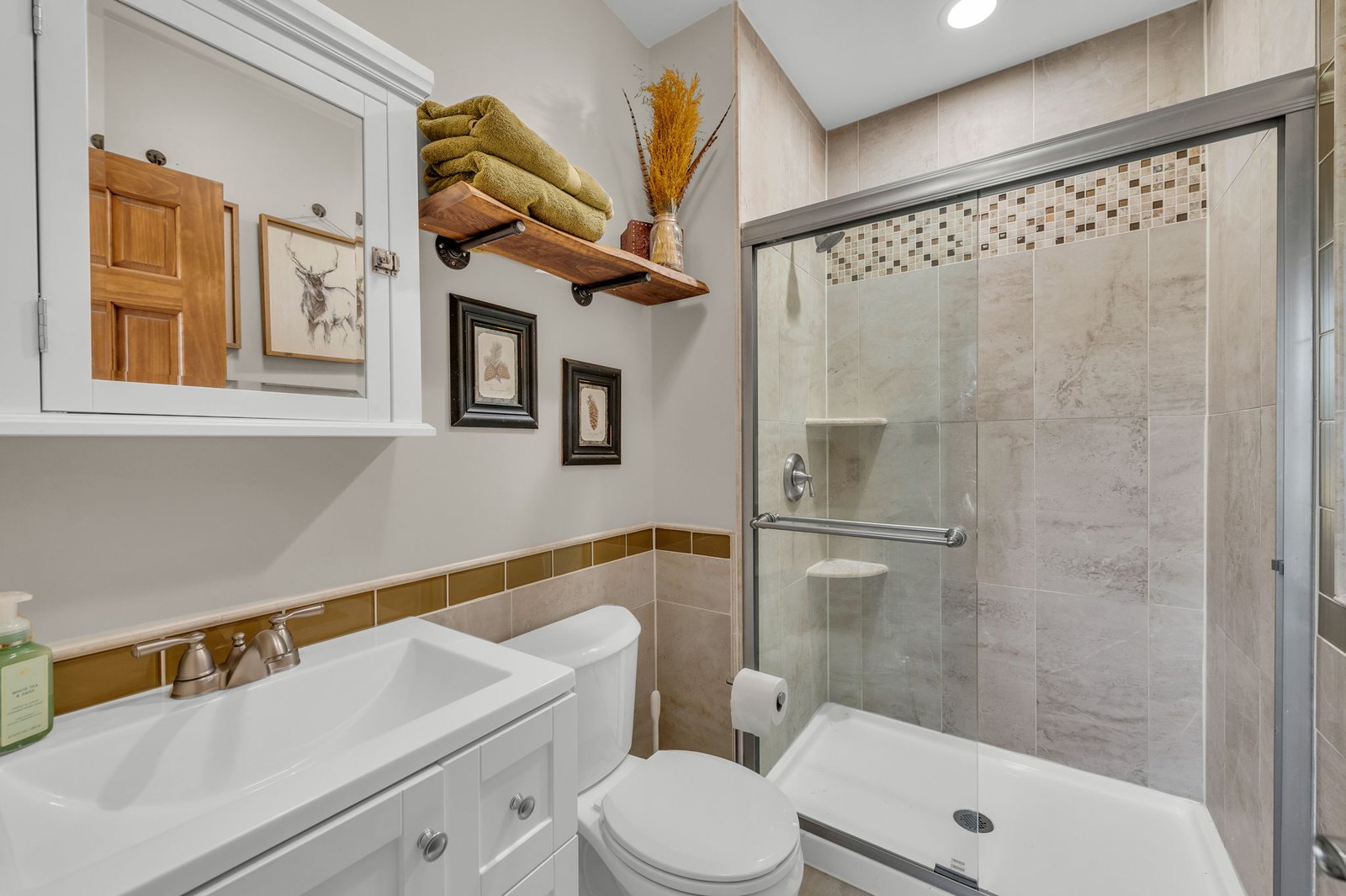 Full bathroom with walk-in tile shower