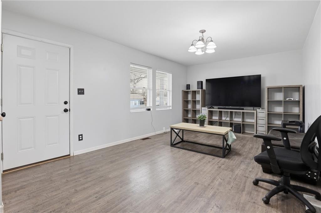 Living room with laminate floors in Crestview, Kansas City, Missouri