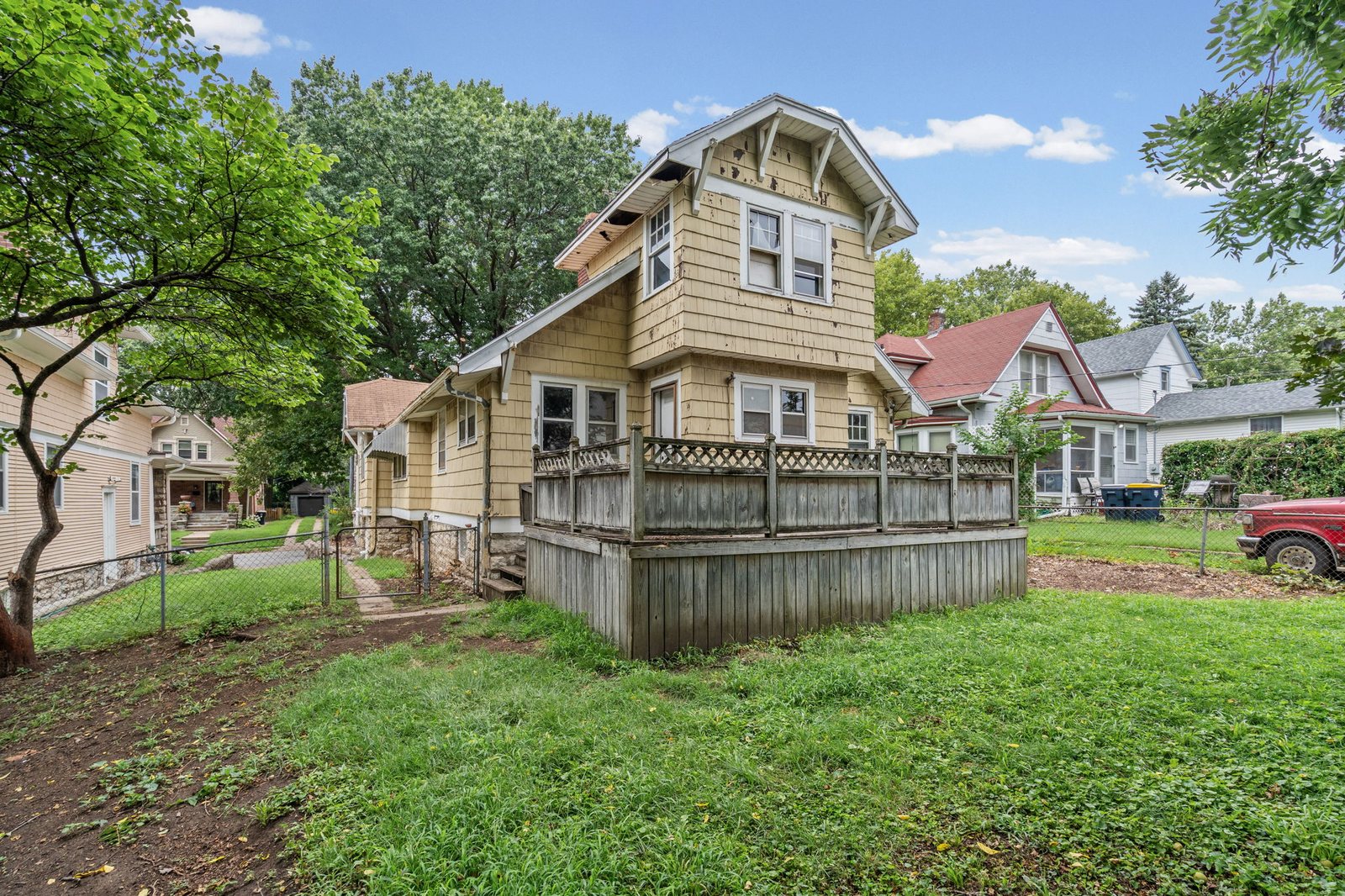 Rear exterior and deck of the 1923 bungalow in Epperson Place, Kansas City, MO