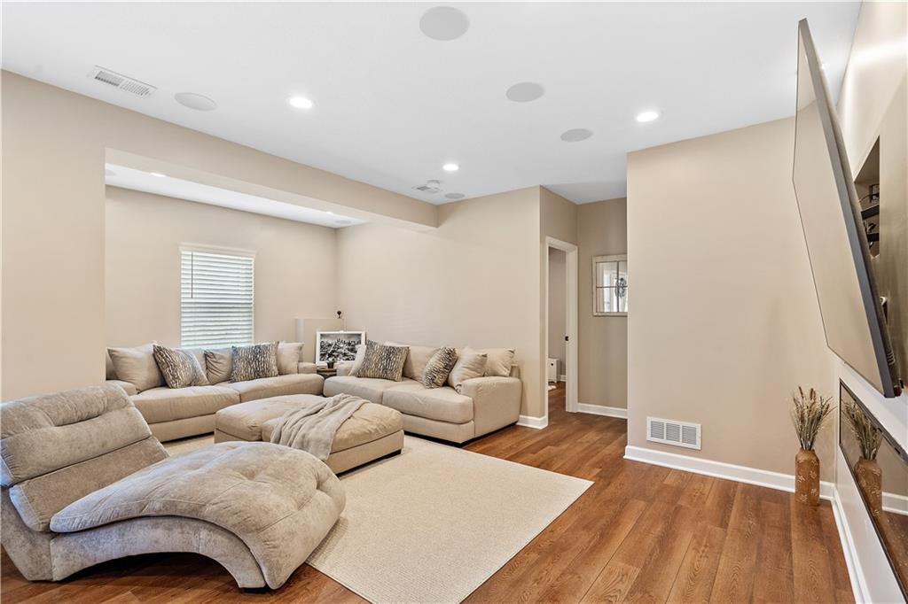 Walkout lower level with luxury vinyl plank floors in a Weston, MO ranch home