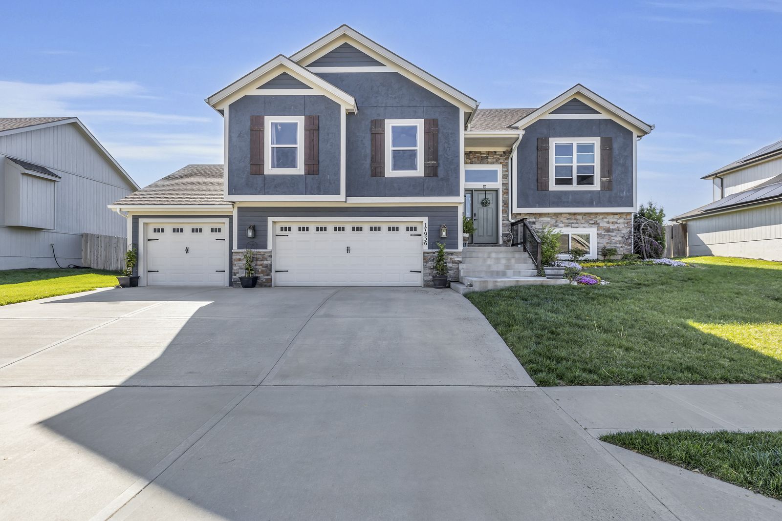 Two-story 2019 home with a three-car garage in the Fiddler's Ridge neighborhood of Weston, Missouri