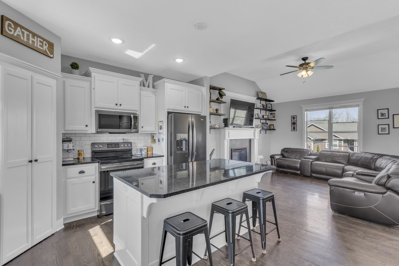 White kitchen with subway tile and stainless appliances in a Weston, Missouri home