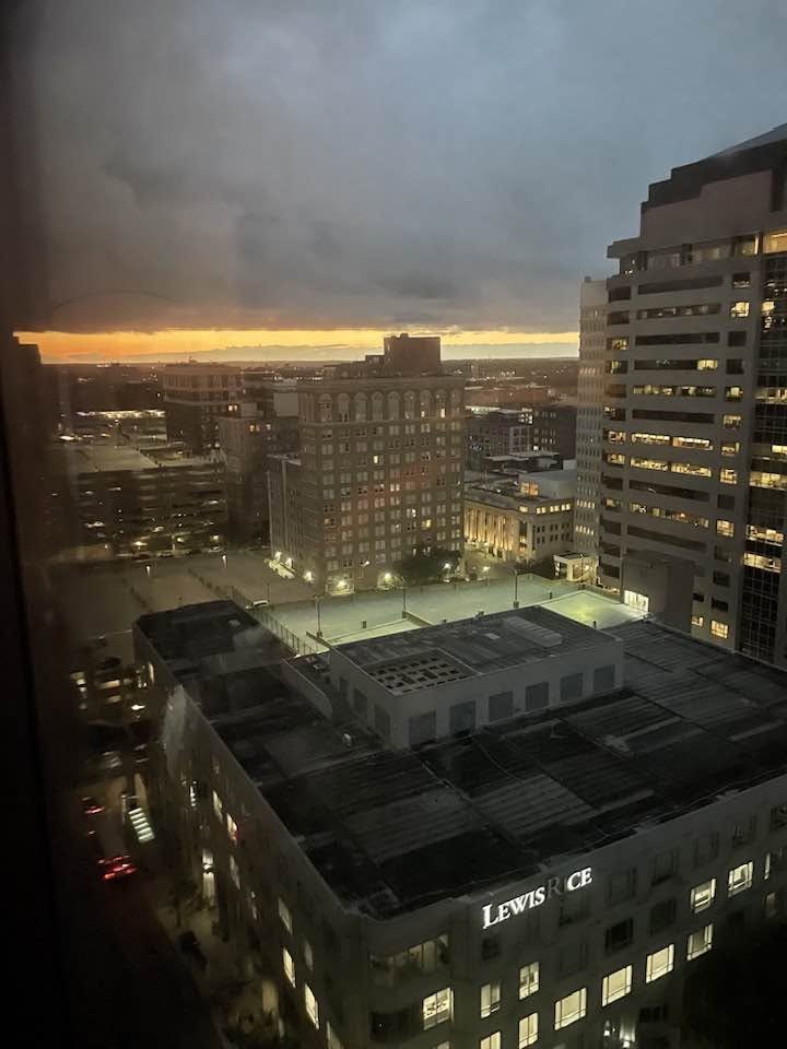 Sunset over the downtown Kansas City skyline seen from a high-rise window, Wallstreet Towers, downtown Kansas City, MO