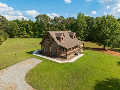 Private log cabin home with shop and horse-ready land