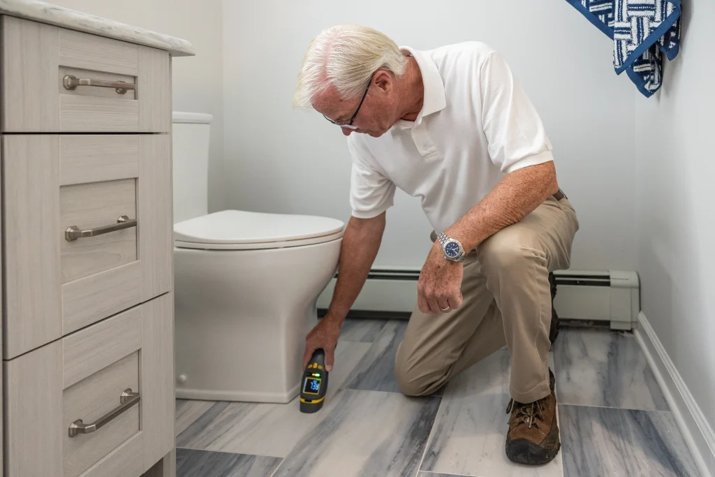 Home Inspector looking at bathroom
