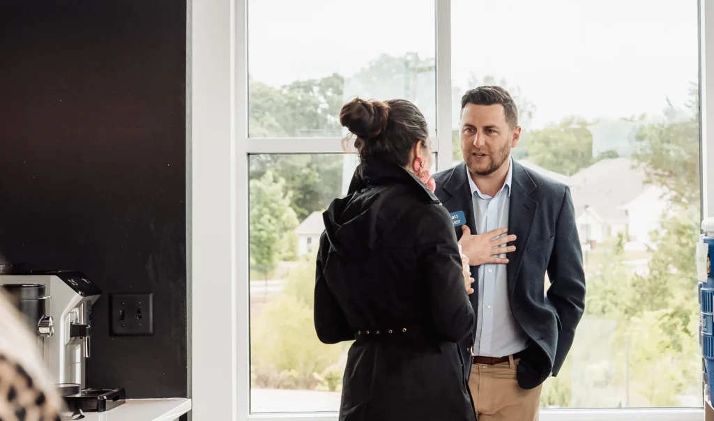 Real Estate Agent debating offer structure of a house