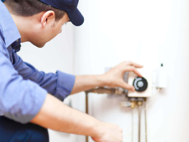 Home Inspector viewing gages