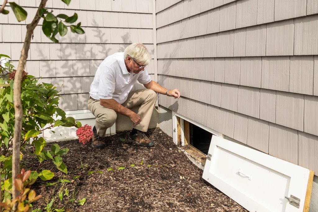 Home Inspector inspecting rural home