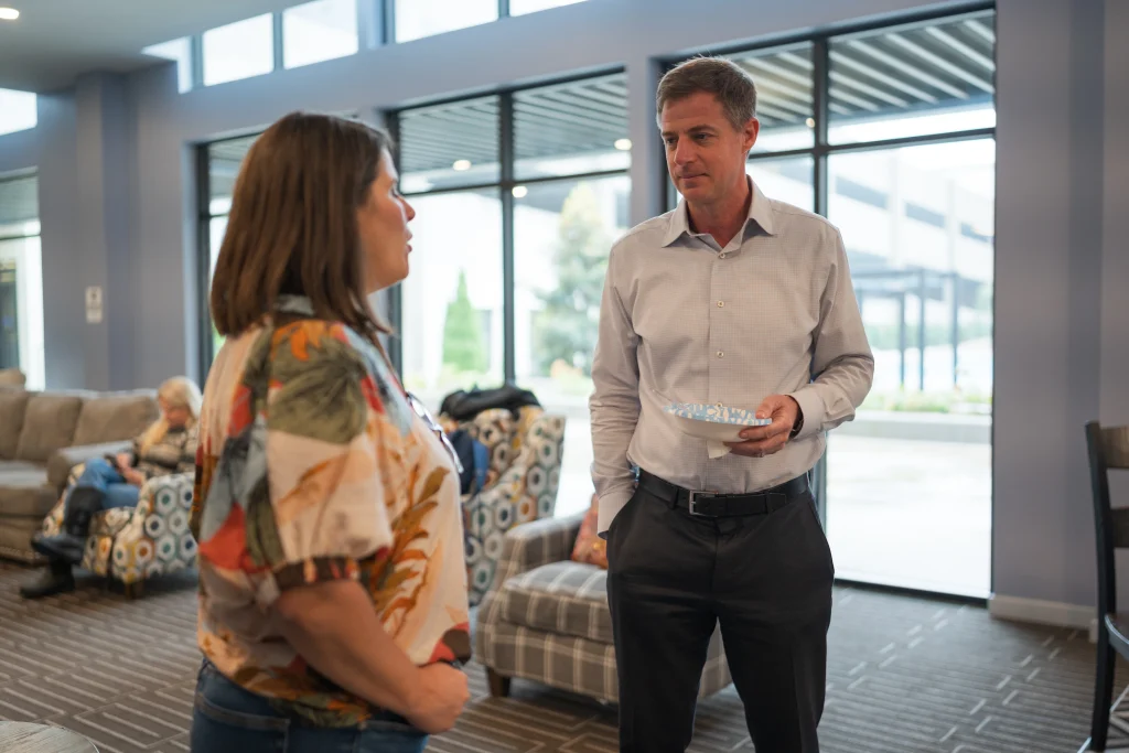 Real estate agents meeting and talking
