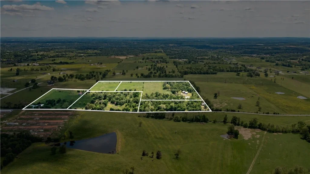 Aerial view of multiple lots outlined by while lines