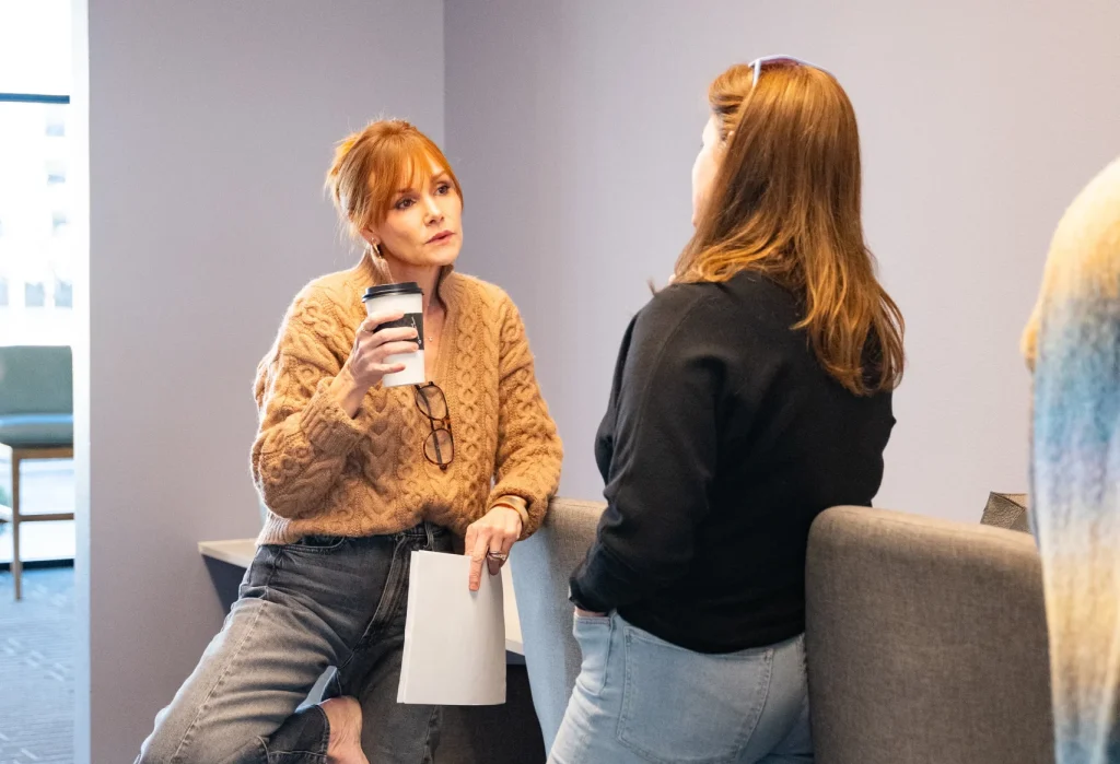 Real Estate Agent and client conversing