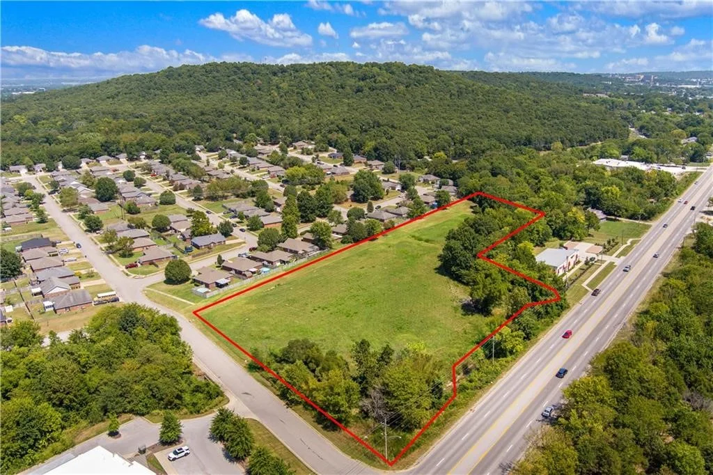 Ariel view of closed land deal with red outline of the area