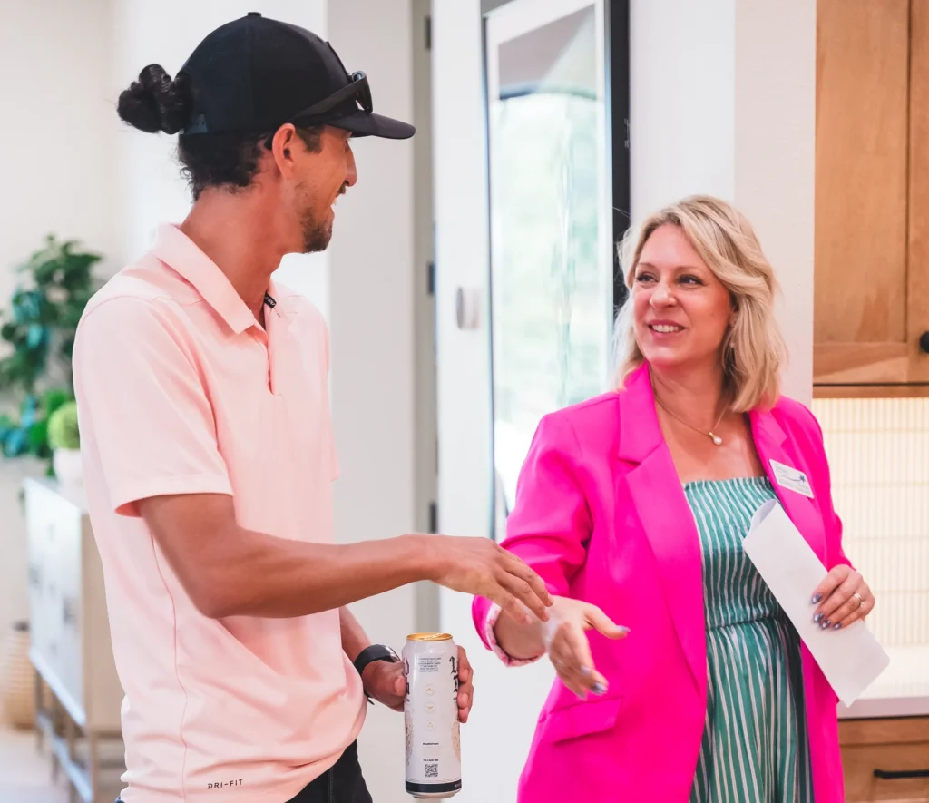 Collier and Associates Real Estate Agent conversing