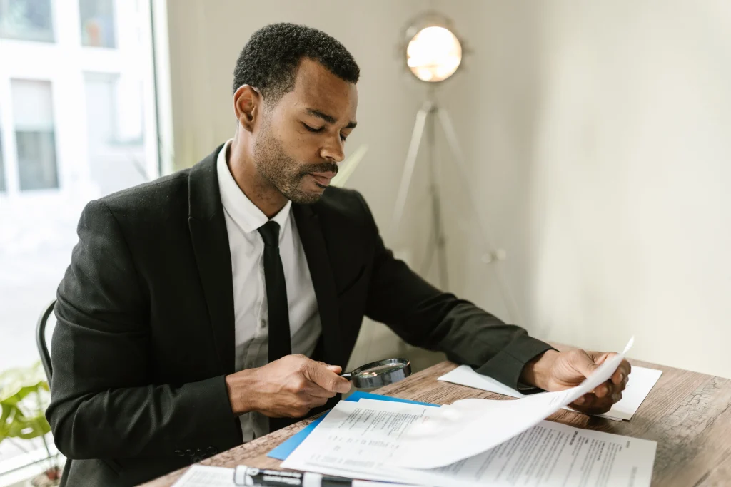 Man reviewing documents at a desk