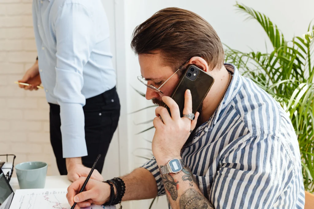 Collier and Associates real estate agent on the phone