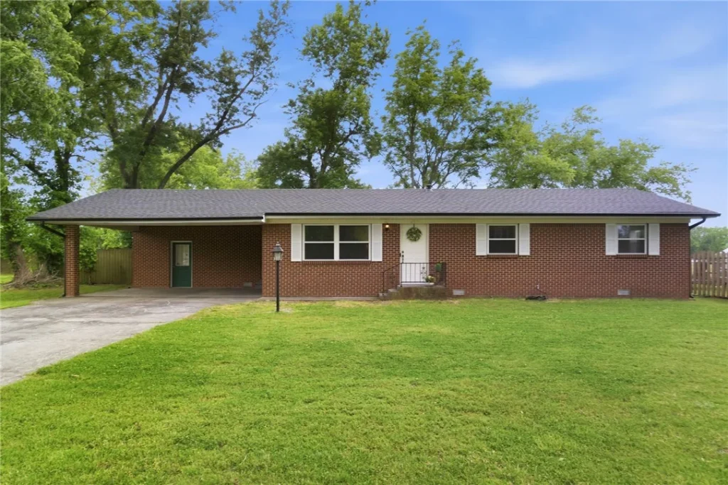 Streetview of brick home in Rogers Arkansas