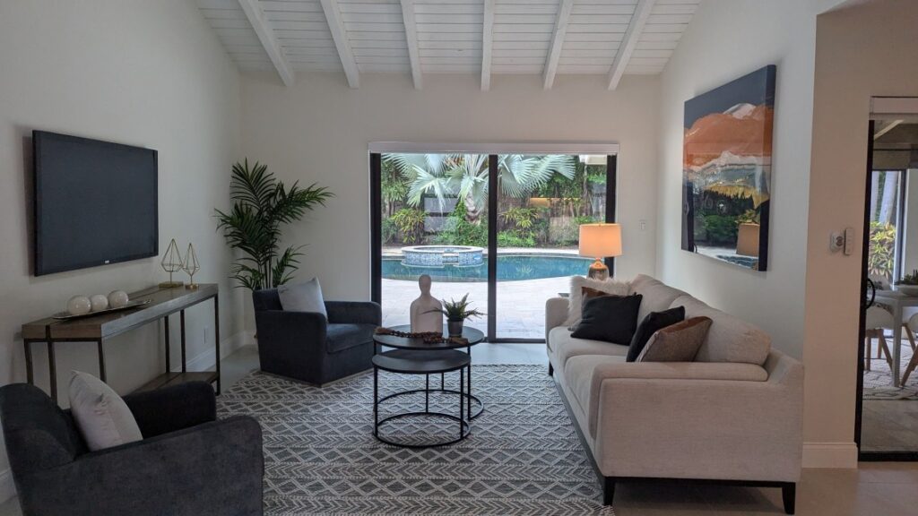 Den looking out to pool