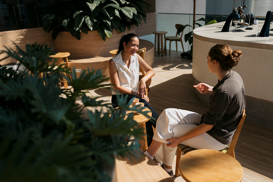 man and woman discussing on the lobby