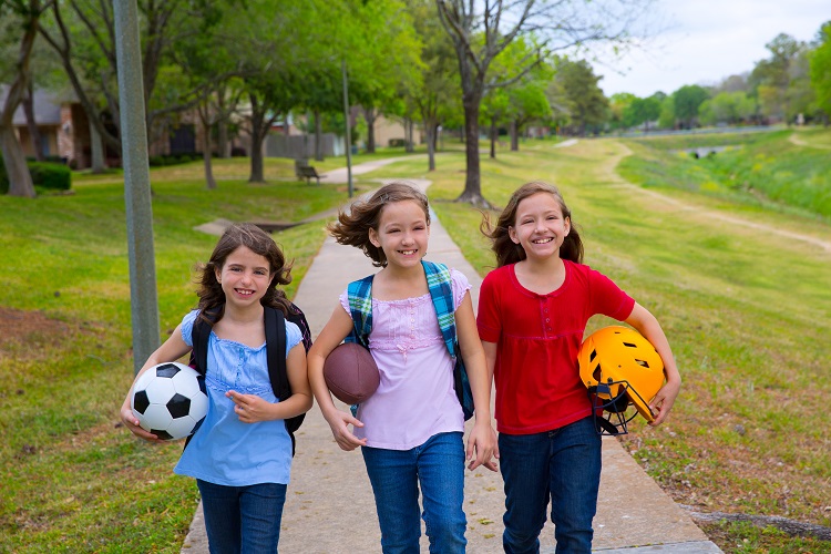 People walking to Irvine sports park