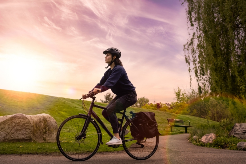 Woman Bike Riding in a Park