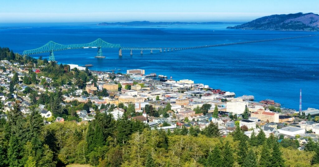 Astoria, Oregon, the first permanent U.S. settlement on the Pacific coast, overlooks the Astoria Megler bridge as it crosses the Columbia river to the state of Washington.