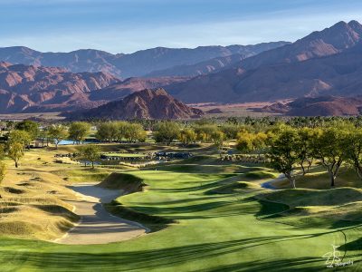 the late afternoon light on the par 5 16th hole of the stadium course at PGA WEST in la quinta, california. Also referred to as “San Andreas” . the large bunker to the left is a 16 foot drop for the level of the green