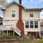 Rear view of 306 Harrison Ave showing basement access and exterior entrance