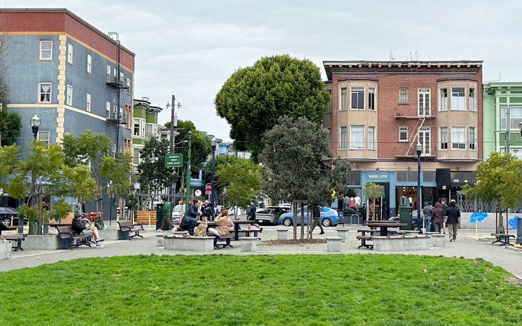 Another view of Hayes Valley's bustling green space and local businesses, highlighting the area's charm and appeal.
