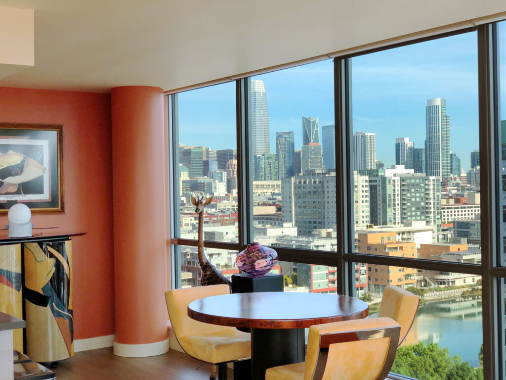 dining table beside a glass wall panels