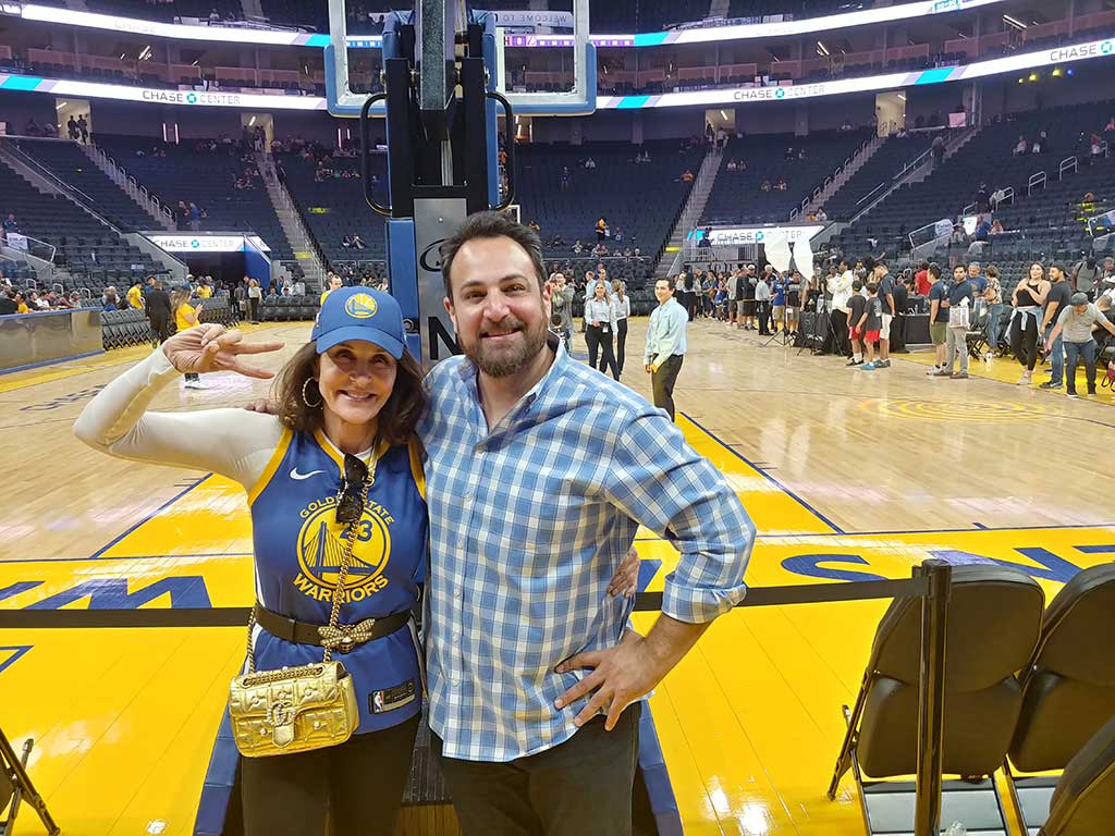 two persons in chase center court