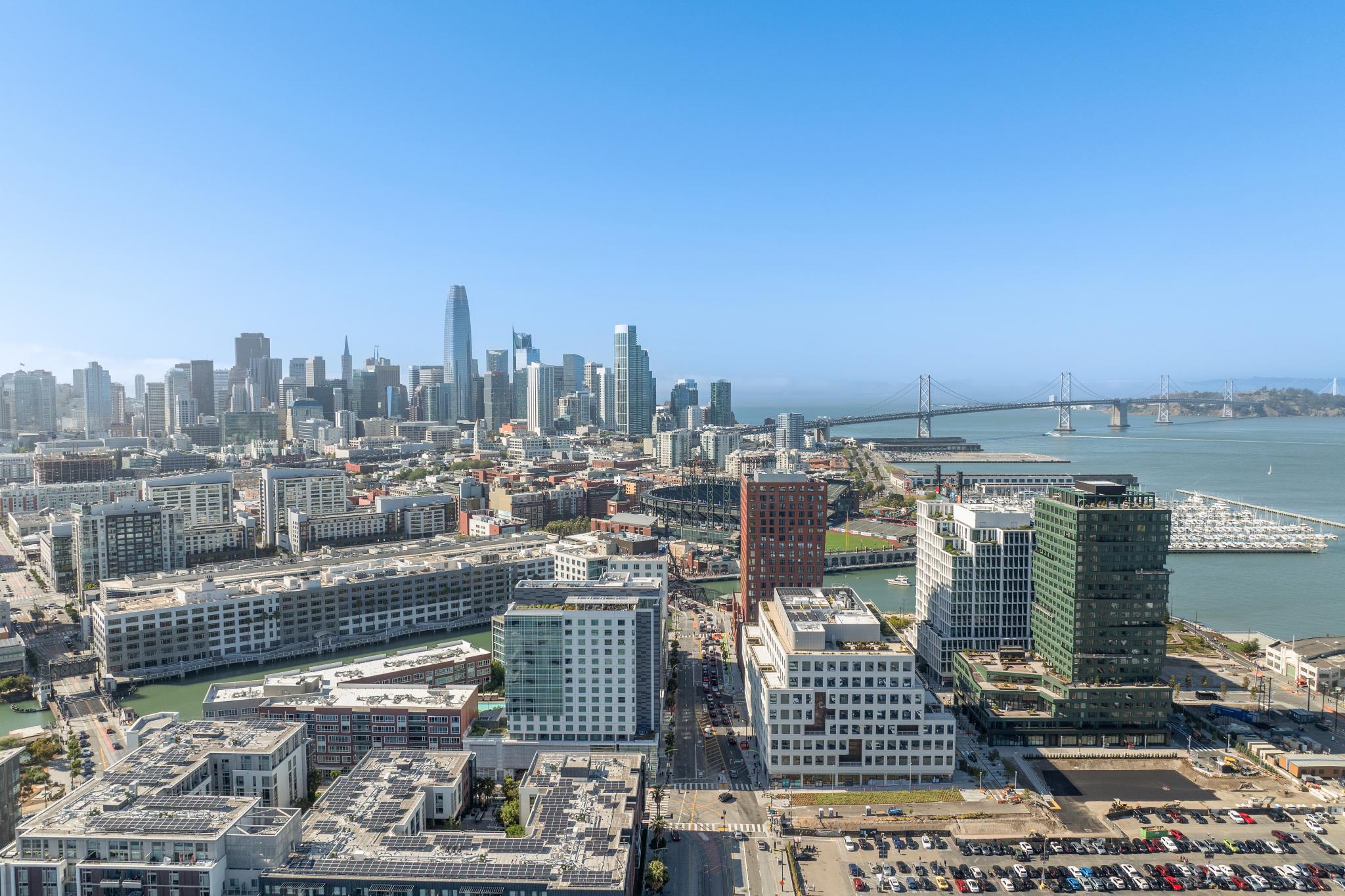 Aerial view of mission bay condo buildings in San Francisco and downtown skyline