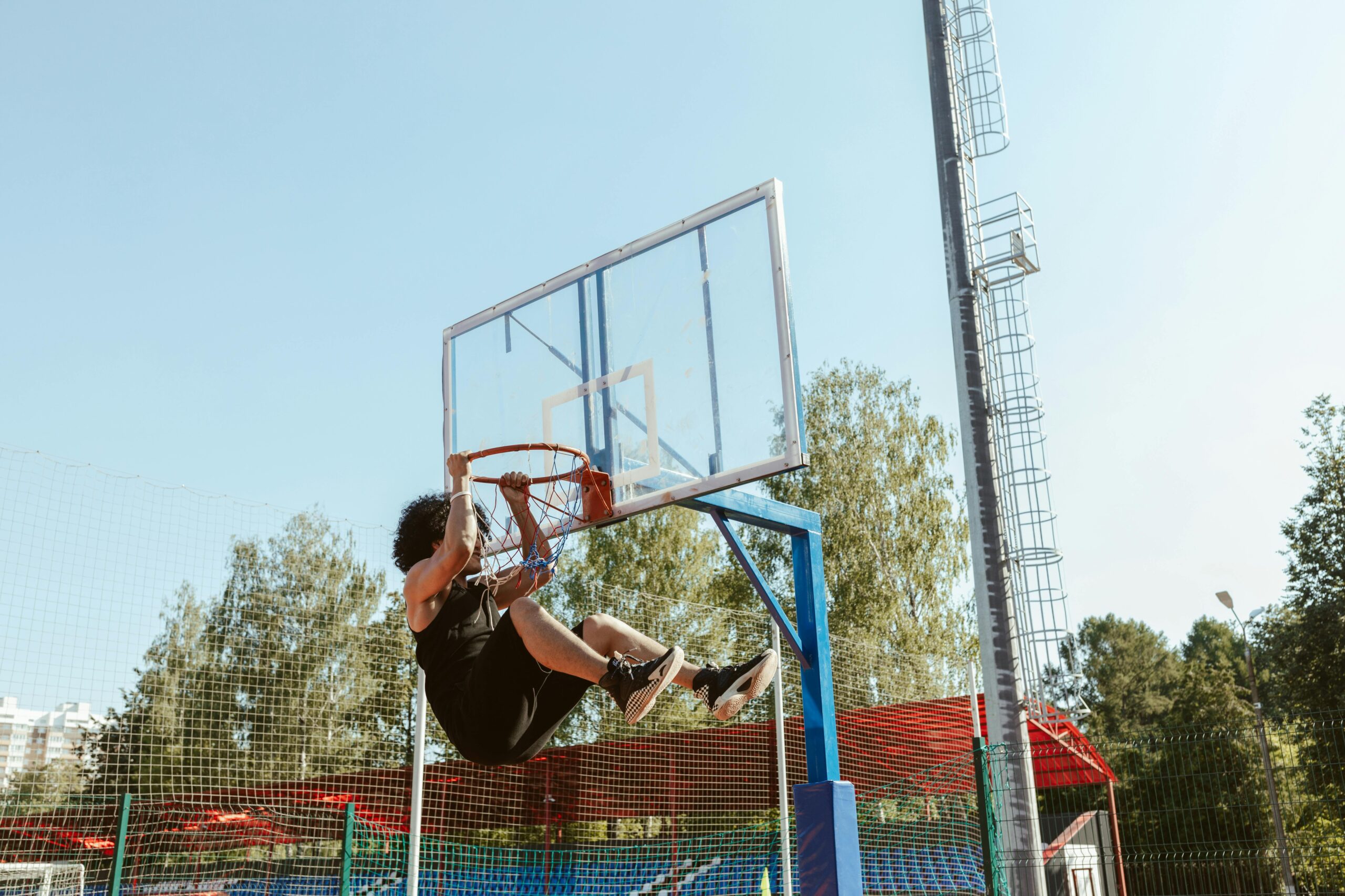 Photo of a woman playing basketball, one of the many things to do in Mission Bay San Francisco