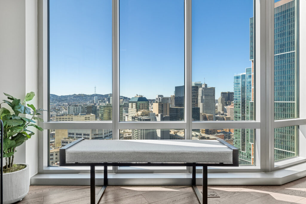 Bench in front of stunning views from a luxury highrise condo in San Francisco