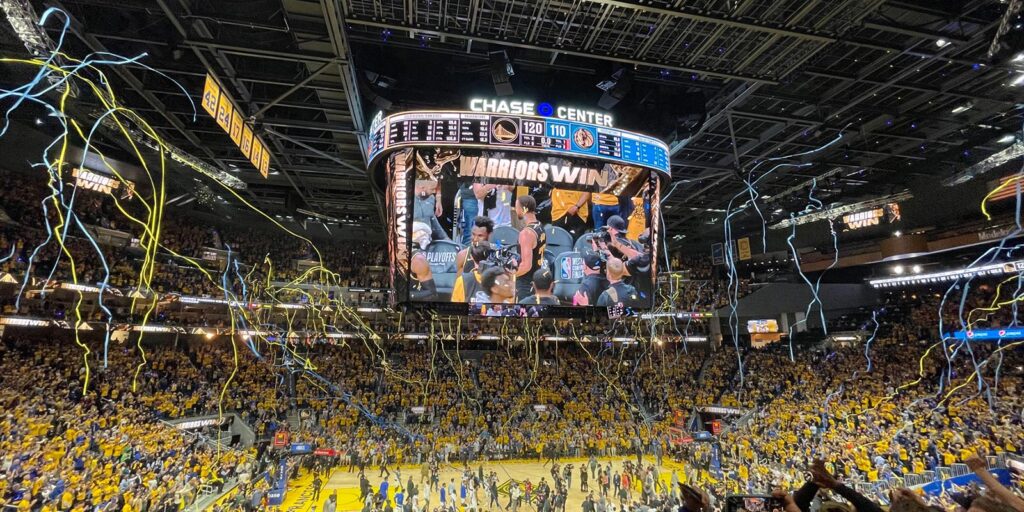 Photo from the Golden State Warriors game at Chase Center with the crowd celebrating a win