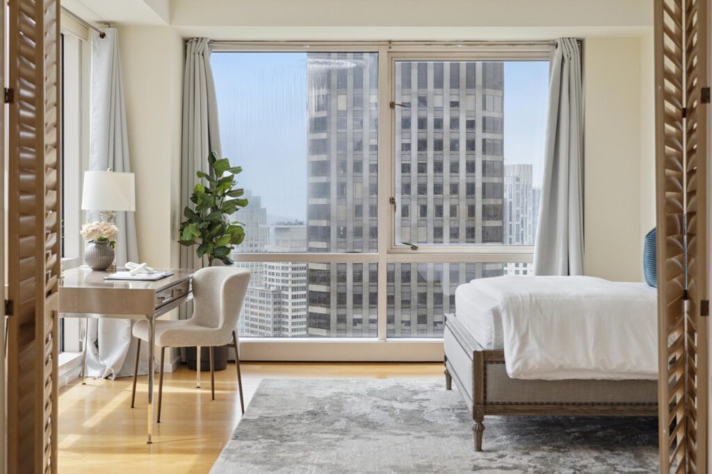 Bedroom and office of a luxury highrise condo sold by Robyn Kaufman, the best San Francisco condo agent for home buyers using AI or other tools to purchase a property