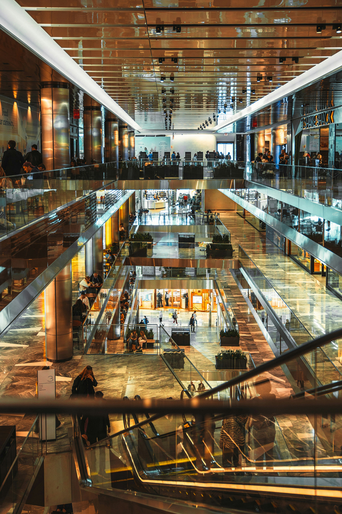 Interior of a modern shopping mall representing top shops and retail spots