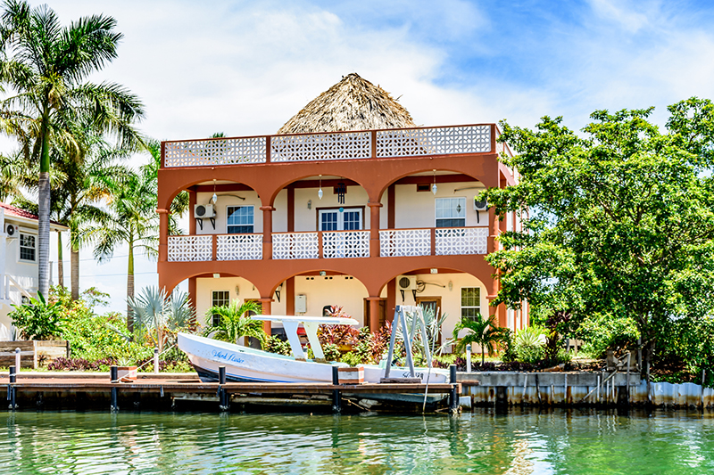 Waterside house & boat, Placencia, Belize,