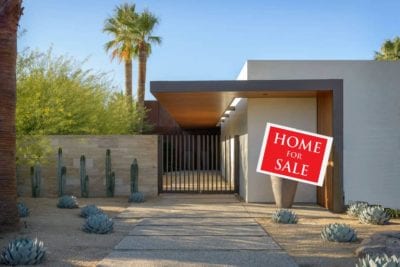 Home with for Sale Sign